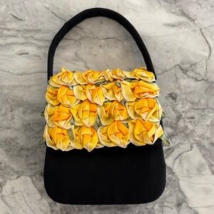 Julie Feldman black mini evening handbag with yellow florals. Like new.